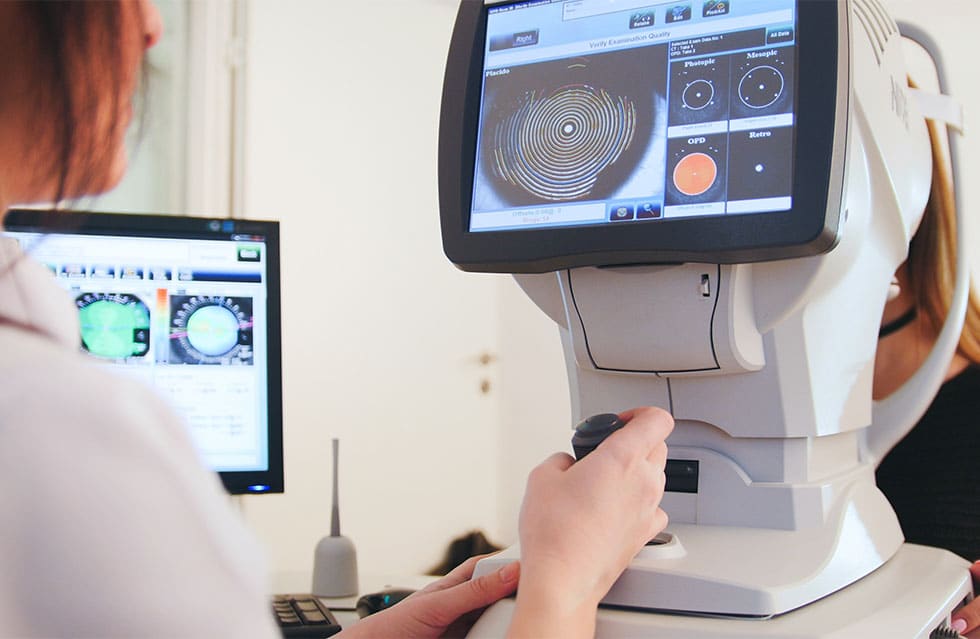 Optometrist performing an eye exam